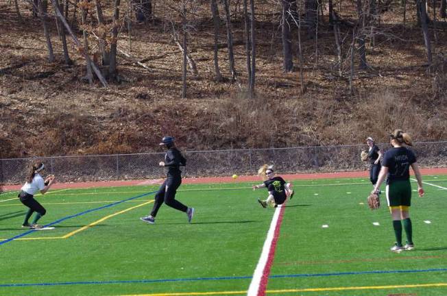 Scrimmages held for area lacrosse, softball teams Sussex Tech's short stop Cheyenne Hamler tosses the ball to third base after loosing her footing. Sussex County Technical High School took on Newton High School in girls varsity softball on Saturday, March 22, 2014. The scrimmage was played at Newton High School in Newton, New Jersey.