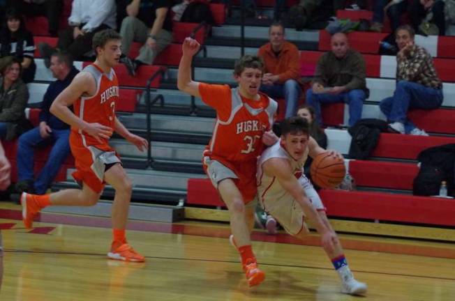 High Point boys reach group semifinals High Point's Kyle Adams with the ball. Adams contributed 19 points in the game.