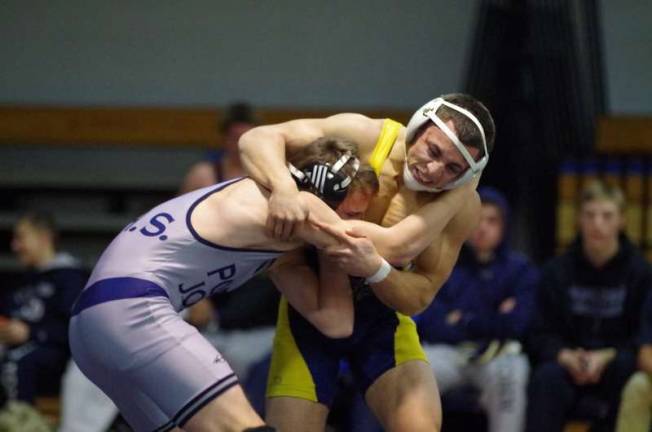 Pope John wrestlers defeat Vernon At right, the Vernon Viking's Jerrain Arroyo celebrated his birthday with a 5-3 victory in the 152 pounds weight class against Pope John's William Koenig. Arroyo turned 18 years old.