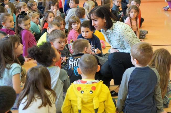 Karate sensei presents book at Cedar Mountain Principal Rosemary Gebhardt fields questions for author and illustrator Melissa La Cour.