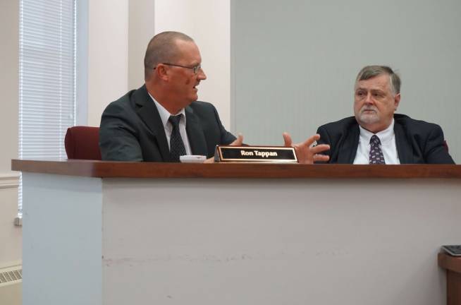 Acting County Administrator Ron Tappan updates the freeholders. Freeholder Phil Crabb is seen at right.