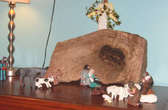 Ruth Preston also sculpted this nativity scene on display in her log home.