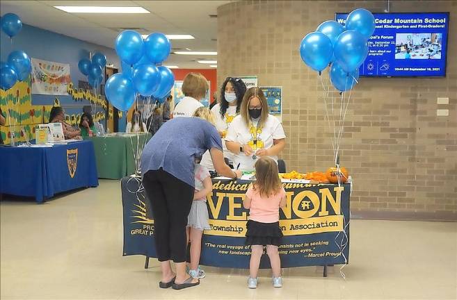 Families enter the open house (Photo by Vera Olinski)