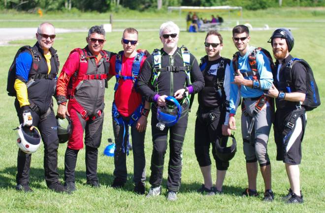 Skydivers Tadeusz Wyrzykiewicz, Rey Duarte, Chris Noonan, Dan Faltyn, Amir Meir, Tyler Delino and Moshe Balalo.