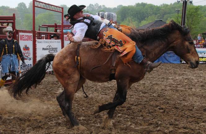 J.R. Mills of Okemos, Mich., is shown bareback riding.