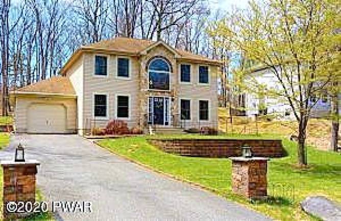 Modern two-story home has lake rights