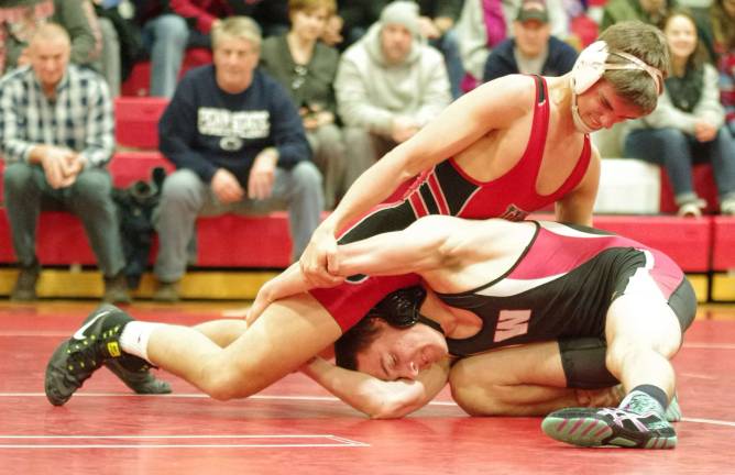 High Point's Trey Osborn on top of Westwood's Matt Tumminell in the 152 lbs match.