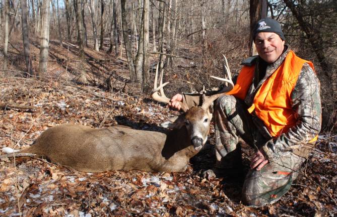 Robert Boselli lands a nine point buck; his biggest ever.