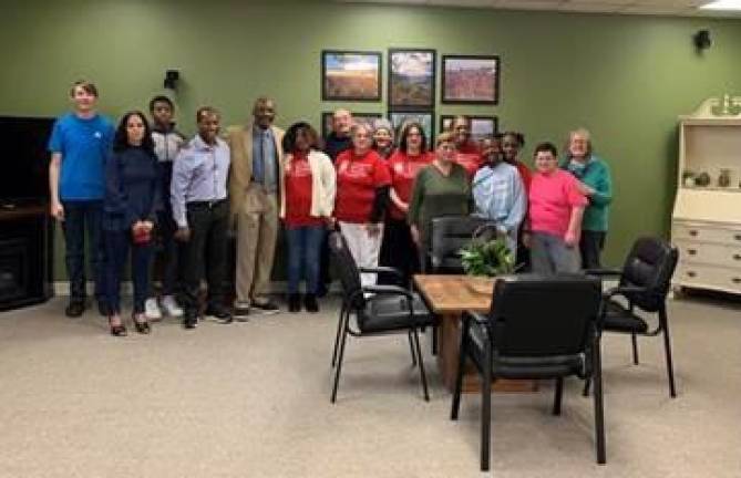 Mayor Howard Burrell with Pastor Edgir Jean and members of the Men’s and Women’s Ministries in the Vernon Senior Center