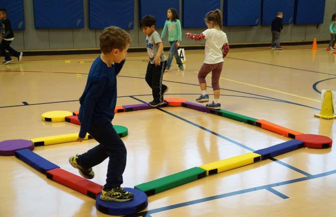 Students practice balancing.