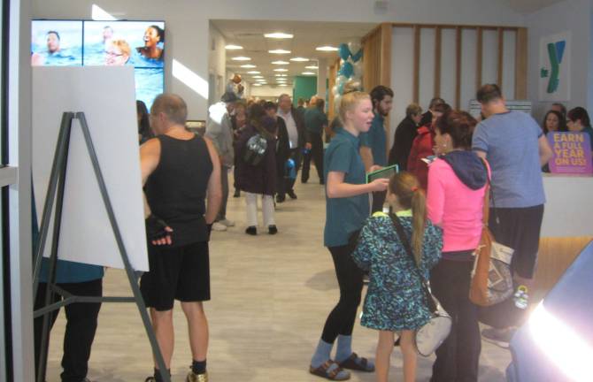 County celebrates YMCA expansion PHOTOS BY JANET REDYKEThe lobby of the Sussex County YMCA is crowded with visitors celebrating the Y’s Open House expansion on Jan. 13.