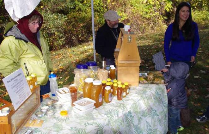 Vernon beekeepers Deb and JC Cowell of the Bees, Birds &amp; Bear Apiary offered a variety of their homemade products.