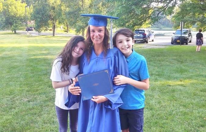 Denise Clarke with her daughter Mikayla and son George.