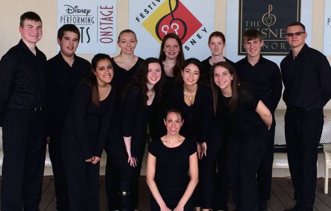 VTHS orchestra, choir performs in Disney World The Vernon Township High School orchestra is shown in Disney World. Orchestra Director Jennifer Krott is shown in the front center.