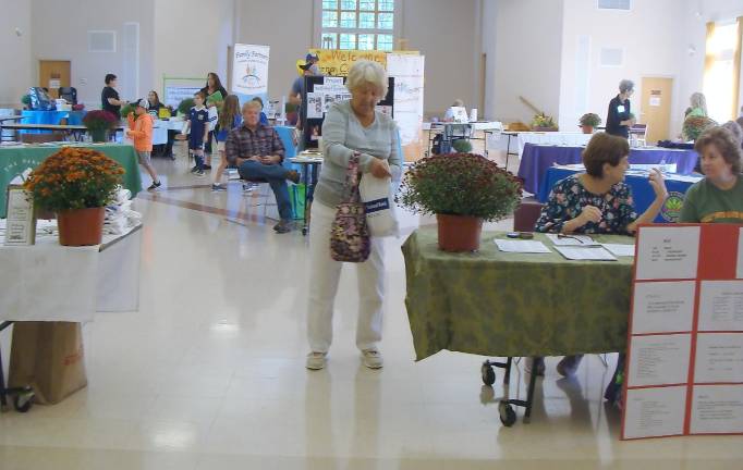 Learning about health Tables were buzzing with health information at the September 28 Health and Wellness Fair held at St. Francis de Sales Church