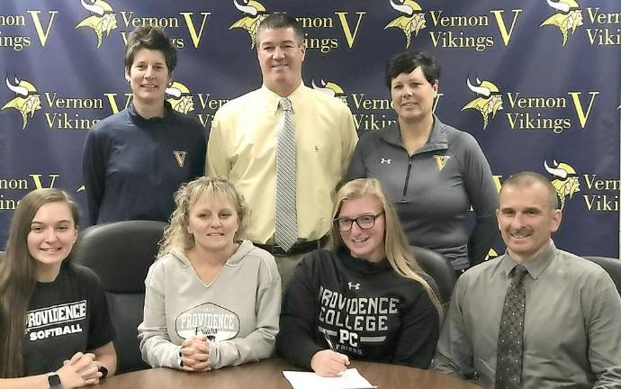 Vernon athletes sign with colleges Seated left to right: Sister Sydney Grifone, Mrs. Grifone, Victoria Grifone and Mr. Grifone; standing left to right:Head Coach Kerry Ludeking, AD Bill Foley and Assistant Coach Mandy Hofmann