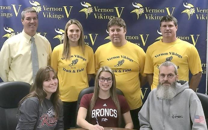 Vernon athletes sign with colleges Seated, from left: Mrs. Wilkens, Jessica Wilkens and Mr. Wilkens. Standing left to right: AD Bill Foley, Assistant Coach Stephanie DePiano, Head Coach Jim Saganiec and Assistant Coach Brian McCarthy.