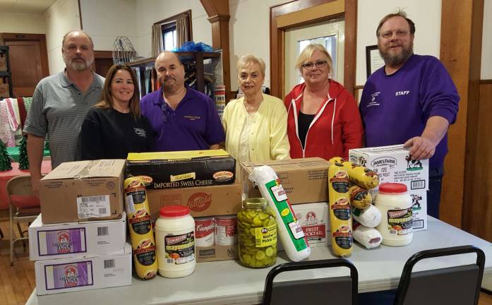 From left,: Steve Clark, PER Sussex Elks Lodge, Patricia Green, PER Sussex Elks Lodge 2288, Warren Wisse, Exalted Ruler Sussex Elks Lodge, Gladys Meyer Volunteer Harvest House, Karen Dykenga Kitchen Manager Harvest House, Richard Green, Treasurer Sussex Elks Lodge 2288.