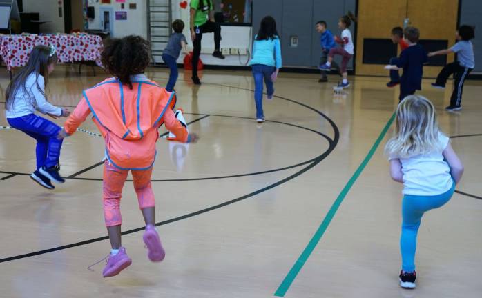 The Cedar Mountain Primary School Kindergarten gym class warms up their hearts.