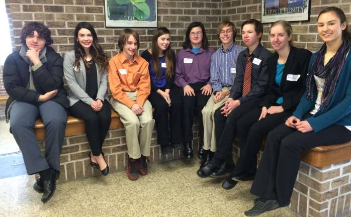 Members of the Academic Decathlon Team get a break between contests at Ramapo High School. From left, Alex Molini, Brianne Cimaglia, Ryan Maass, Alison Specht, John Allogio, Matt Maass, Jacob Gehrig, Rose Wolthoff and Maya Rakoczy.