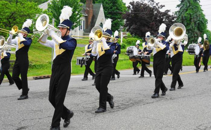 The Vernon Township Viking Marching Band plays and marches.