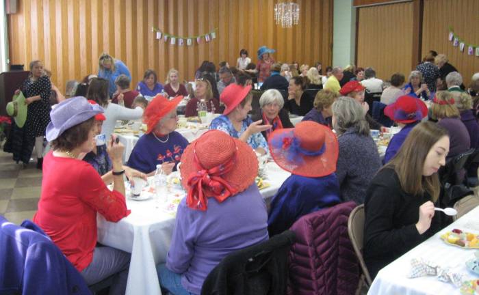 The high tea was attended by many including the local Red Hat Society.