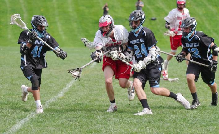 High Point falls to Parsippany Hills High Point's Shawn Matthews carries the ball in the first half as Parsippany Hills defenders close in.