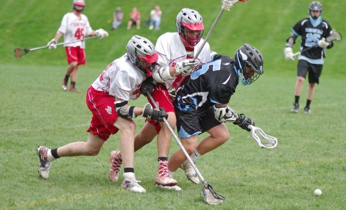 High Point falls to Parsippany Hills High Point's Shawn Matthews and Troy Van Orden and Parsippany Hills' Brandon Verderber pursue the ball.