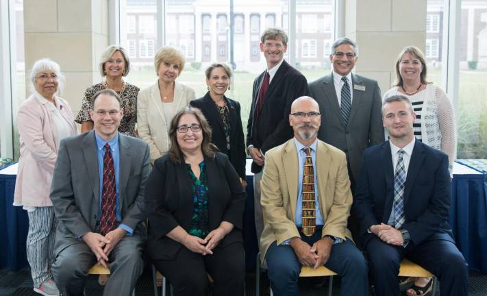 Pictured: Back row Dr. Mercedes Aguirre Batty, SCCC VP of Academic Affairs; Lisa Angeloni, TCNJ VP for Enrollment Management; Bozena Leven, TCNJ Interim Dean of School of Business; Kathryn Foster, TCNJ President; Dr. Jon Connolly, SCCC President; Jeff Osborn, TCNJ Dean of School of Science and Suzanne McCotter, TCNJ Dean of School of Education. Seated: Steve Schreiner, TCNJ Dean of School of Engineering; Dr. Dina Conde, SCCC Dean of Liberal Arts and Sciences; Taras Pavlovsky, TCNJ Dean of R. Bar