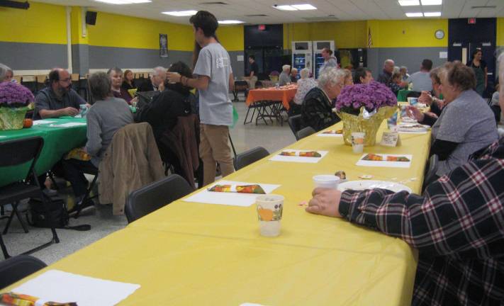 PHOTOS BY JANET REDYKETurkey lovers fill the cafeteria of Vernon Township High School as the annual benefit dinner supports the efforts of Harvest house.