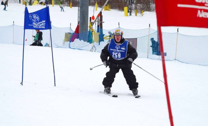 Highland Lakes resident Shawn Barber is shown on the Slalom racecourse. He won a silver medal for his efforts.
