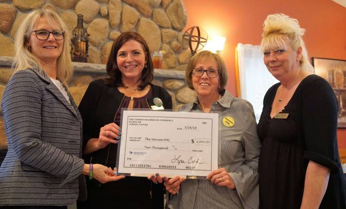 From left, Margaret Kranz receives the Vernon PAL $2,000 donation from Jennifer Hopper, with Jeanne Buffalino and Lynn Card.