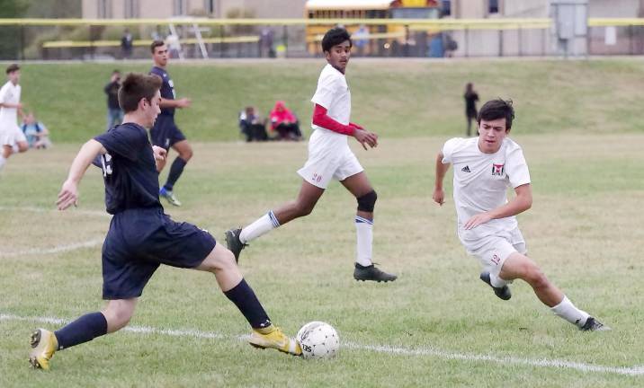 Vernon soccer player Nolan Shade kicks the ball.