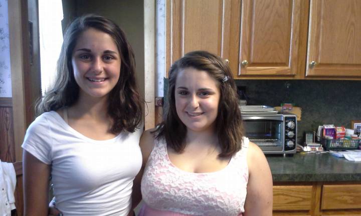 Brittany and Danielle Weiss are shown after making their hair donations.