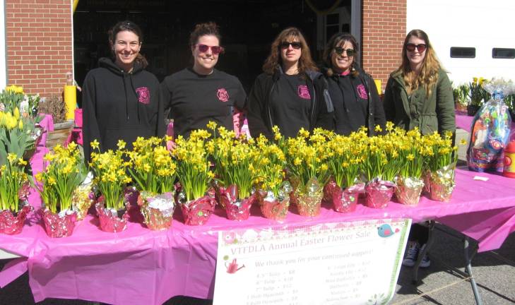 PHOTOS BY JANET REDYKE The ladies of the Vernon Firehouse gear up for the weekend sale of Easter flowers. From left are Kayla Turner-Boss, Rory Byra, Kareen Alba, Alex Krystofik and Kasey Della Torre.