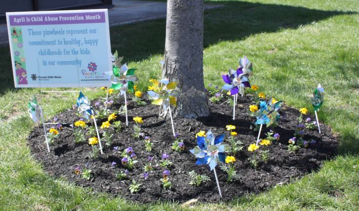 The Vernon Township Woman&#xfe;&#xc4;&#xf4;s Club created this pinwheel garden at the Vernon PAL Building in observance of Child Abuse Prevention Month.