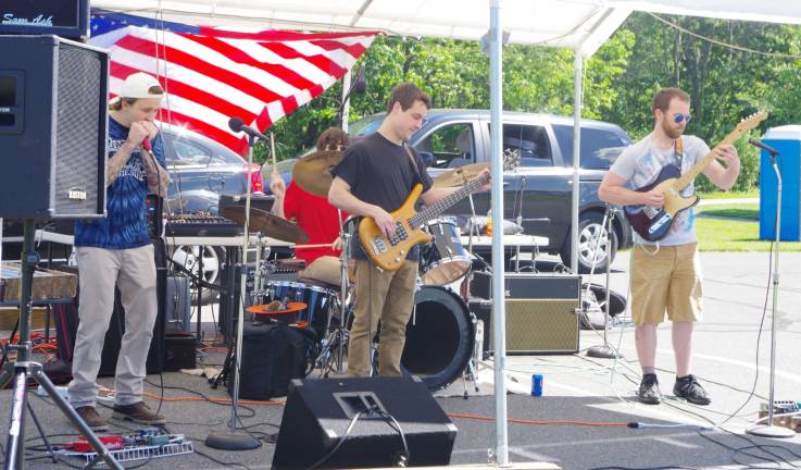 Local band Uncle Stump performs.