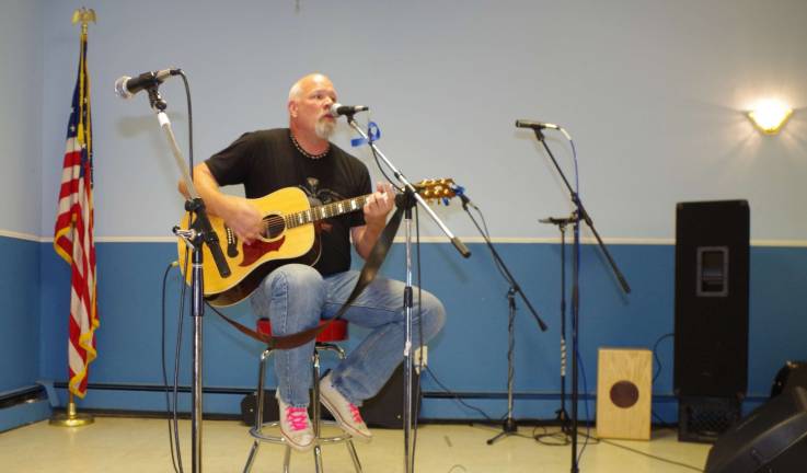 Vernon resident David Vandenheuvel of the group Clovis performs at the fundraiser for Safe and Sound Animal Rescue. Photo by Chris Wyman.