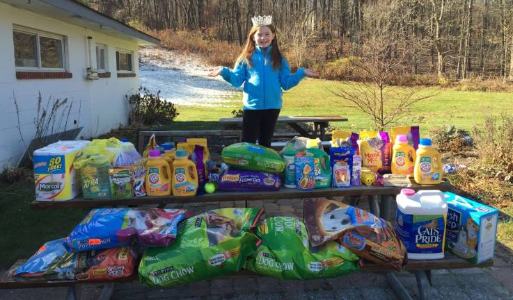 Mackenzie Genung, USA National Miss Northern New Jersey Princess held a fundraiser on Nov. 2 to benefit the Wantage Animal Pound. People could come with a donation and bowl for free at Circle Lanes bowling alley in Ledgewood. Donations included cat and dog food and treats, toys, paper towels, detergent, towels and much more. She dropped all the items off on Nov. 15 to the Wantage Pound.