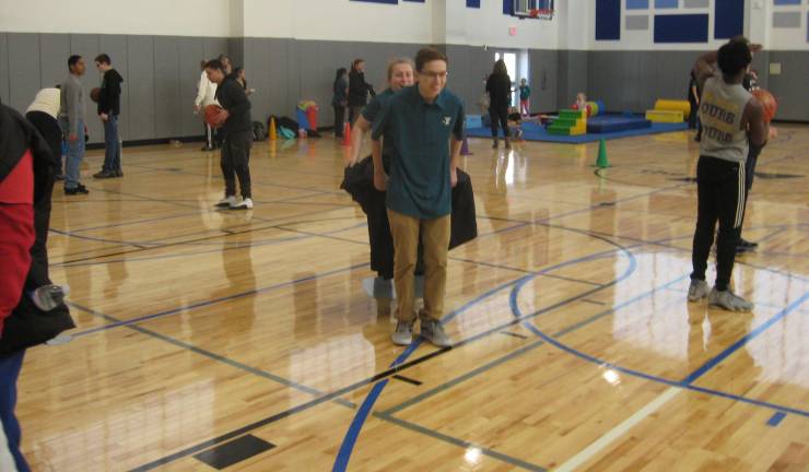 The shiny, brand new basketball gymnasium was a hit with all ages.