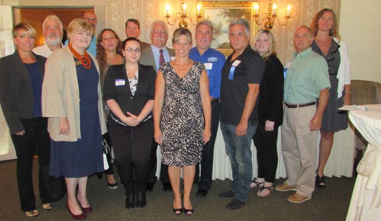 Chamber inducts new businesses In the front row, from left to right, are: Terri Trapp, Primarica, Inc.; Allison Falcaro, Justino Investments; and Tammie Horsfield, Sussex County Chamber of Commerce. In the second row, from left to right, are: Kris Perry-Tedesco, Warrior's Path Crossfit; Dr. Greg Stetzel, Workplace Wellness Assistant, Inc.; Carl Scheuermann, Unlocked! Escape Rooms; Rachel Geraci, Movement Mortgage; Mark Trapp, Primerica, Inc.; Bob Bertoli, Movement Mortgage; Bill Thiede, Global Home Improvements; Joseph Miranda, Sparta Soft Wash; Kristin Moughrabie, Little Pampered Princess; Ken Aulicino, Residential Home Funding - Byram; and Tawnie Scymanski, Alpine Roofing, LLC.