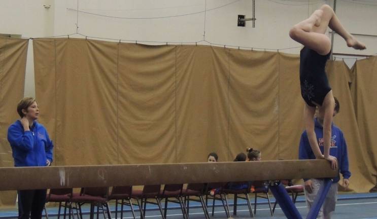 Giant Gymanstics’ Garden Gators take top honors All-Around Platinum Champion DAra DePaolo of Wantage is shown on the balance beam.