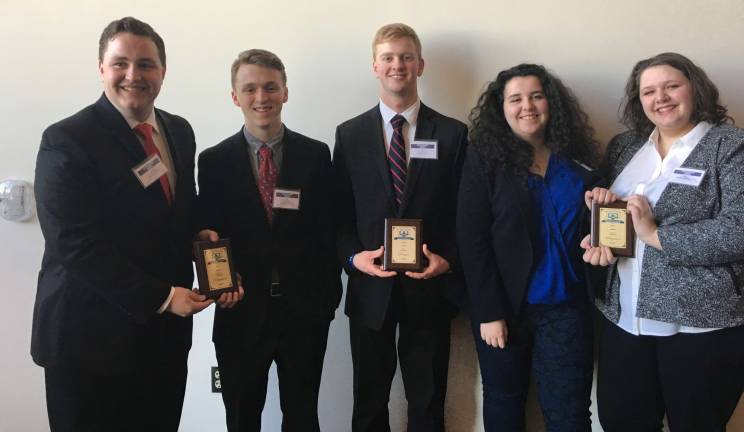 Pictured from left, Frank Incarnato and Jameson Parker won Best Delegation (Russia) for Commission for Peaceful Uses of Outer Space; Chris Ploch won Best Delegate (Russia) for Security Council; Ciara Clarkin and Zoe Heath won Best Delegation (Syria) for Human Rights.