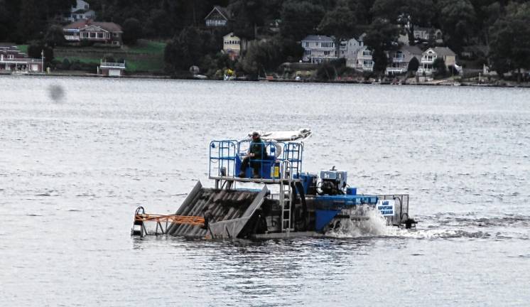 A losing battle at local lakes? One of the Lake Hopatcong harvesters approaches the launch at Nolan’s Point. (Photos by Jane Primerano)