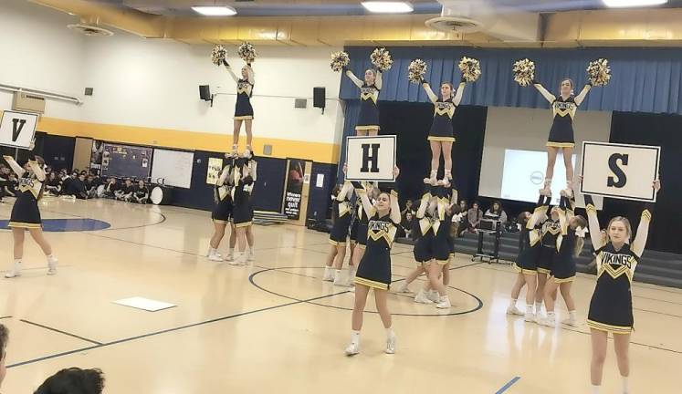 Vernon schools hold recruitment day The cheer team performs sideline cheer.