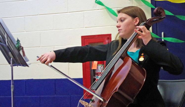 Cellist Victoria Menenes, 16, a junior at Vernon Township High School, performed a medley of American patriotic songs during the annual Vernon PAL Youth Leadership Cultural Day.