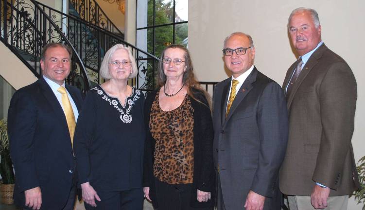 From left, David P. Romano, vice president and CFO, Barbara Hansen resident of Hamburg, and Margo Johnson, resident of Hackettstown, Dominick J. Romano, vice president and COO, Hank Ramberger, general manager.