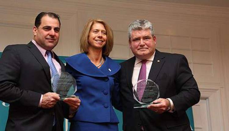 Sen. Steven Oroho (right) and Sen. Parl Sarlo (left) display their awards with NJBIA&#x2019;s President and CEO Michele Siekerka.