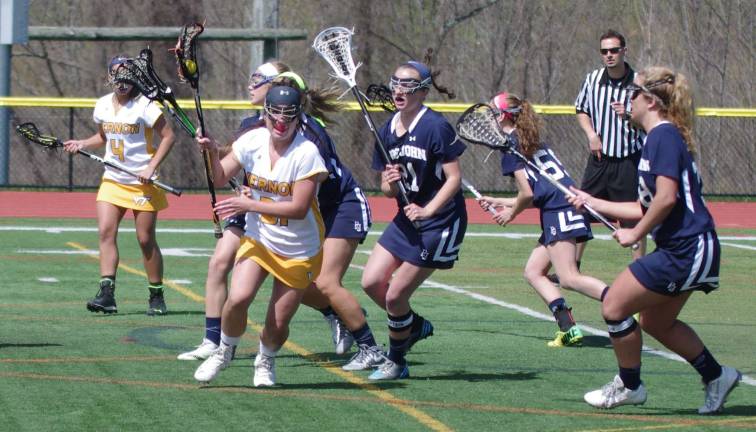 Callahan's 200th goal highlights Pope John win Vernon Viking McKenzie Alter moves the ball.