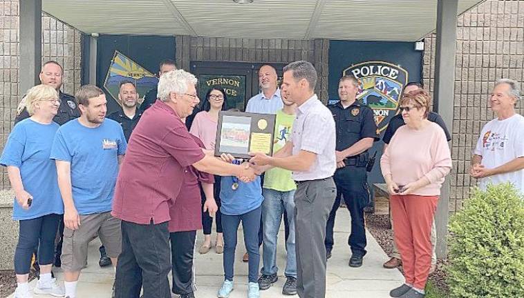 Vernon Township Police receive plaque from local Special Olympics teams Special Olympics teams, the Vernon Express/Sussex Rollers, presented a plaque of gratitude to the Vernon Police Department on May 27 for their support of the program.